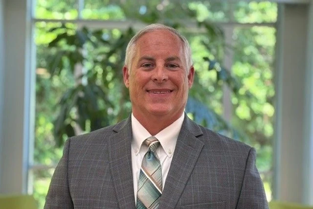 James Black standing inside a BSV branch.